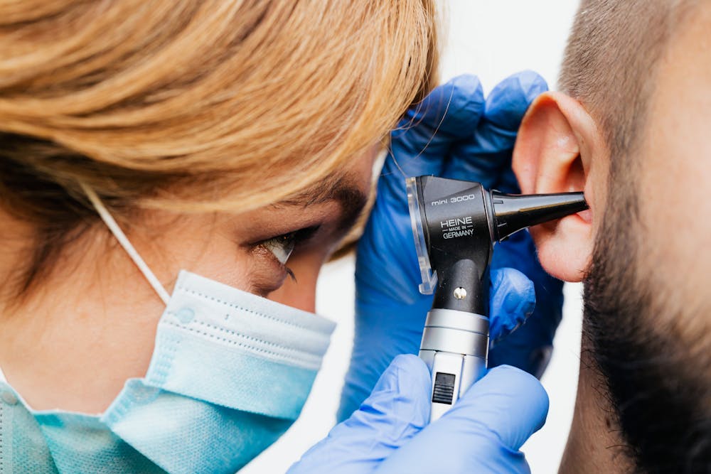 doctor doing ear examination